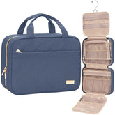 NISHEL Travel Toiletry Bag in Aegean Blue with main compartment for cosmetics and travel-size bottles.