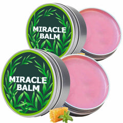 Nitidissima Miracle Balm jar closeup showing creamy texture for soothing joints and skin.