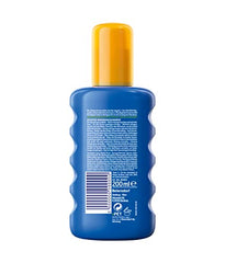 Nivea Sun SPF 30 spray on forearm shows even coverage