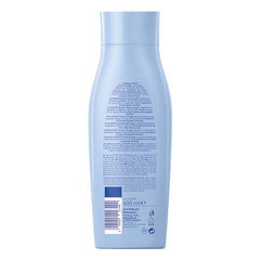 NIVEA Volume & Strength Shampoo with foamy lather on wet hair