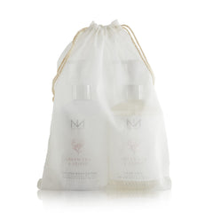 Niven Morgan Green Tea & Peony hand lotion bottle designed for nourishing skin after washing.