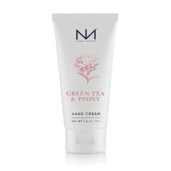 Niven Morgan travel hand cream bottle with green tea and peony scent offering moisture and a non-greasy feel