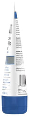 Nizoral pre-shampoo being massaged into the scalp for micro-exfoliation.