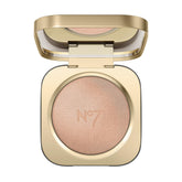 No7 Radiant Glow Powder Highlighter Pink Silk swatch on the cheekbone for a natural luminous glow.