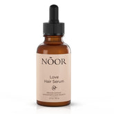 NOOR HAIR Growth Serum bottle close-up showing a non-greasy daily-use formula.