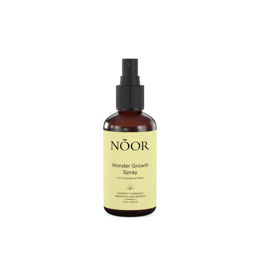 NOOR HAIR Wonder Growth bottle pour for easy scalp application and quick absorption