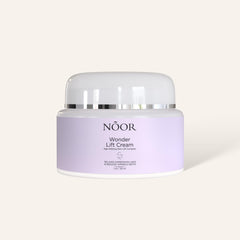 Noor Hair Wonder Lift Cream tube close-up shows lightweight hydration for daily use.