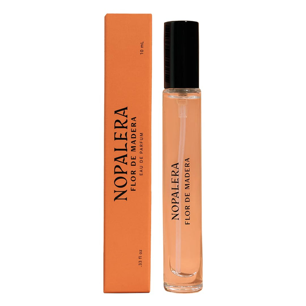 Nopalera Flor de Madera travel spray bottle for on-the-go fragrance.