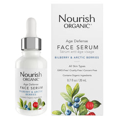 Nourish Organic Face Serum bottle pour highlights bilberry for radiant skin.