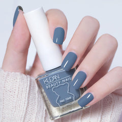 NovaCharm Blue Nail Polish bottle showing deep blue shade with long-lasting color.