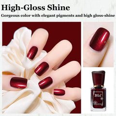 NovaCharm swatch on nail in dark burgundy with glitter shimmer.