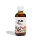Nuele Hair Serum bottle application; lightweight, residue-free formula for all hair types.