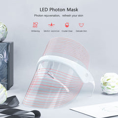 NUFR LED face mask emitting blue light on the face for oil control testing