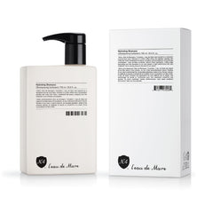 Number 4 Hydrating Shampoo bottle closeup highlighting a moisturizing formula for soft, shiny hair.