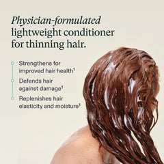 Nutrafol Conditioner pump in shower used for easy daily care.