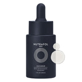 Nutrafol Men's Hair Serum bottle on a clean surface for daily use.