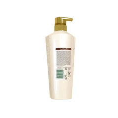 Nutribela 15 Intensive Repair Shampoo label close-up emphasizes nourishing formula for resilient strands