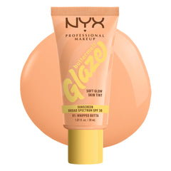 NYX Professional Makeup Buttermelt Glaze bottle demonstrates dewy glow with SPF 30.