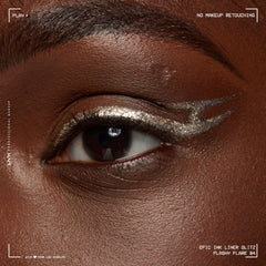 Liner worn on eyelid showing saturated glitter line