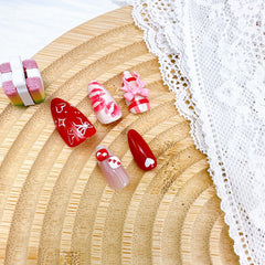 NZRAESTRS almond medium nails offering a chic, comfortable silhouette