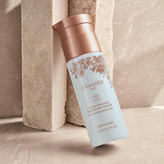 Floratta Blue lotion being applied to skin showing quick absorption.