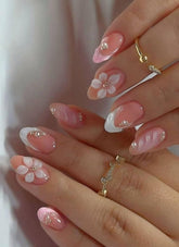 OCOUYVD flower press-on nails pearls close-up for elegant DIY manicure.