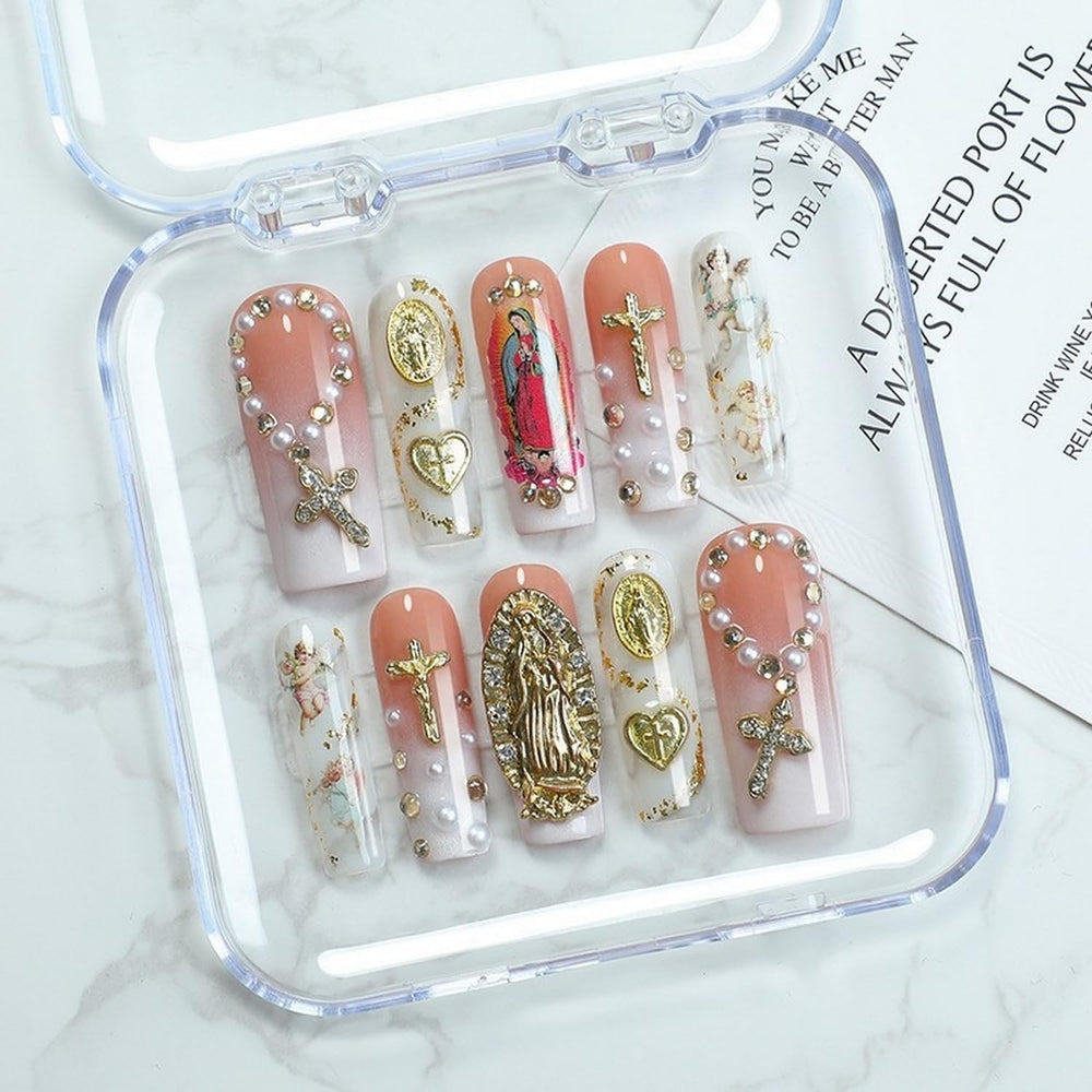 OCOUYVD handmade nails with long coffin shape and pearl heart for elegant styling.