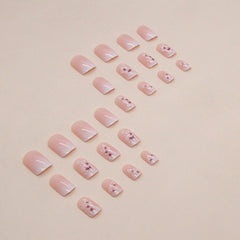 OCOUYVD square nails with delicate floral accents ideal for everyday wear.