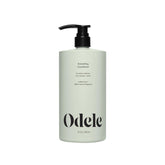 Odele Smoothing Conditioner bottle shows long-lasting moisture and frizz control.