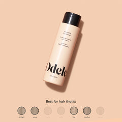 Applying Odele conditioner to hair for smooth, frizz-controlled results