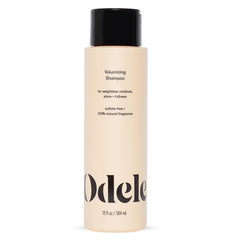 Odele Volumizing Shampoo bottle-front view highlighting weightless cleansing.