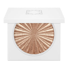 Ofra Glow Goals highlighter compact open shows champagne glow with a smooth finish
