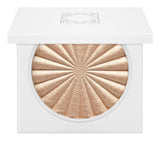 Ofra highlighter Rodeo Drive bottle swatch showing champagne glow