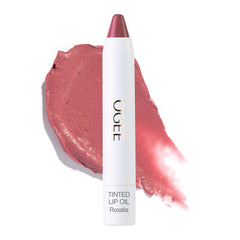 Ogee Rosalia tinted lip oil bottle shows dusty rose tint for nourished lips