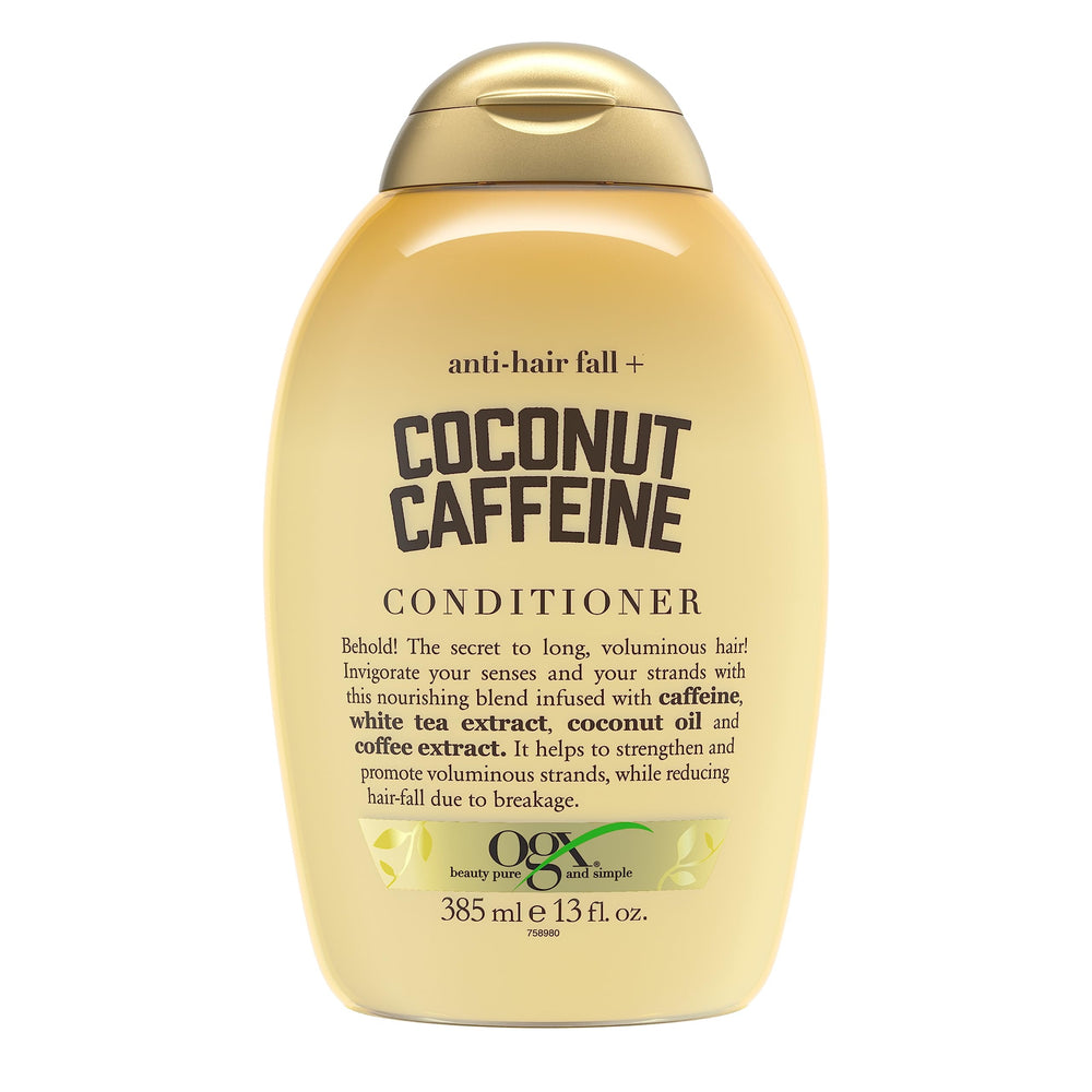 OGX Anti-Hair Fall bottle on shelf highlights coconut caffeine conditioner benefits.