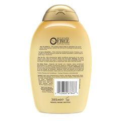 OGX conditioner applied to wet hair shows easy application.