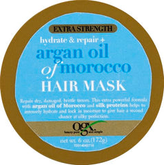 OGX Hair Mask being applied to wet strands for conditioning