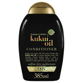 OGX Kukui Oil Conditioner bottle close-up showing glossy, hydrated hair ready for styling.