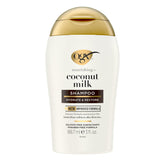 OGX Nourishing Coconut Milk Shampoo bottle shows hydrating formula for soft, frizz-free hair.