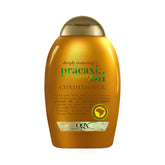 OGX Pracaxi Recovery Oil Conditioner bottle highlighting deep hydration for curly hair.