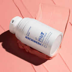 Ole Henriksen PHAT Glow Facial Mask being applied to reveal a soft pink glow