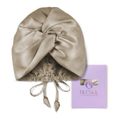 OLESILK silk bonnet for sleeping shown with adjustable drawcord for a snug, comfortable fit.