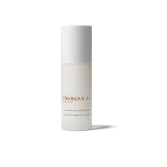 Omorovicza Illuminating Moisturizer bottle pour highlighting ruby crystals for radiant hydration
