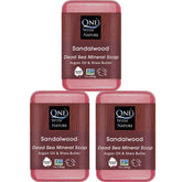 One With Nature Dead Sea Salt Sandalwood soap bar 3-pack on display for purifying exfoliation.