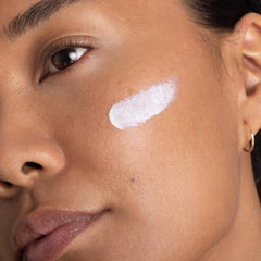 OneSkin OS-01 mineral filters protecting skin from UV exposure.