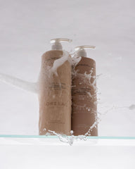 ORI LAB Curl Cleanse pour demonstrates easy application for curls