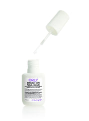 Orly Brush-On Nail Glue in use for precise nail repair and artificial nail application.