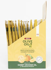 ORS Olive Oil Strengthen & Nourish conditioner application for smoother detangling