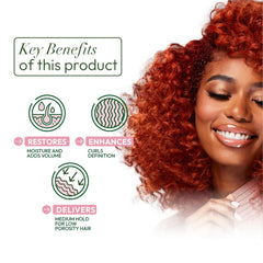 ORS Olive Oil Curlshow Milk moisture glow on frizz-free curls with shine