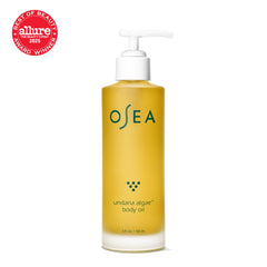Pouring OSEA Undaria Algae Body Oil shows light, non-greasy hydration